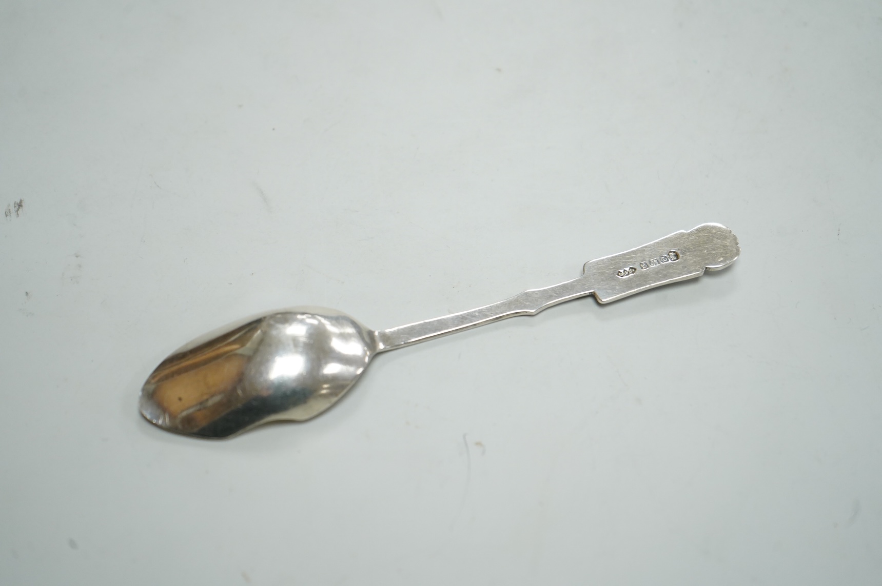 A George V Liberty and Co silver grapefruit spoon, designed by Archibald Knox, Birmingham, 1935, 12.4cm.